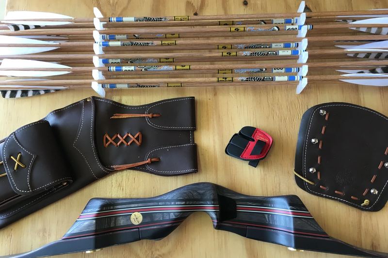Arrows, quiver, finger tab and arm guard